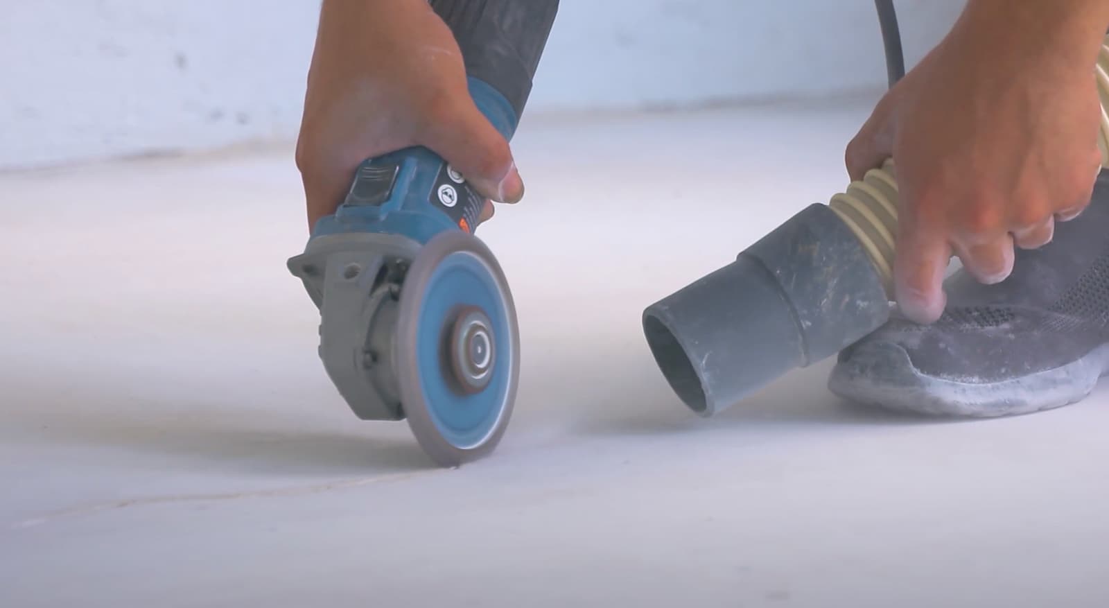 grinding concrete and removing dust